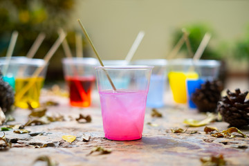 Epoxy resin in cup for casting Stabilizing wood and pine cone hybrid