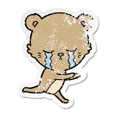 distressed sticker of a crying cartoon bear