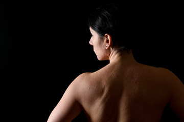 Naklejka premium back of middle aged woman