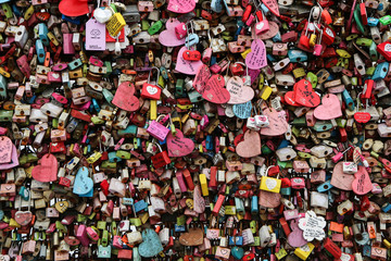 Fototapeta na wymiar A detail picture of the love locks hanging at the Namsan Tower in Seoul, Korea. 