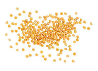 Pile of dry aromatic yellow mustard seeds isolated on white background, top view.