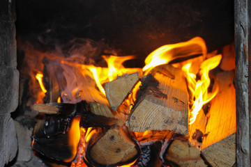 beautiful fire background in the fireplace. wood burning in the fireplace