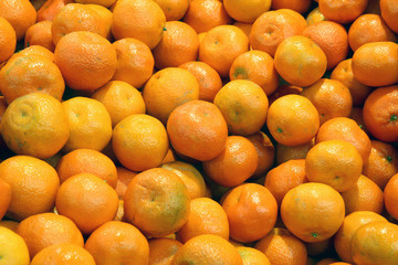 orange background of fresh tangerines