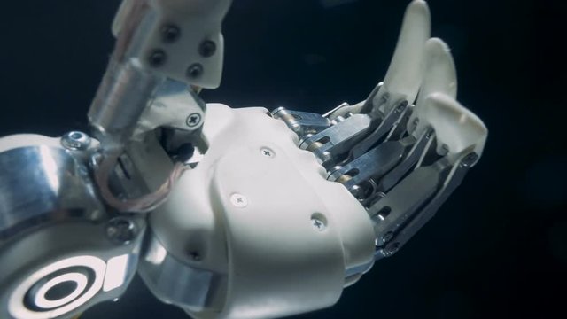 Modern hand prosthesis bending fingers automatically.