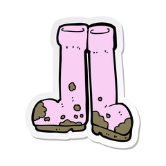 sticker of a cartoon muddy boots