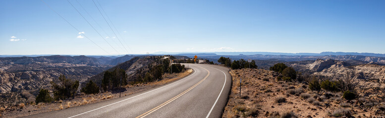 Scenic road in the desert during a vibrant sunny day. Taken on Route 12, Utah, United States of America.