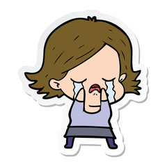 sticker of a cartoon girl crying