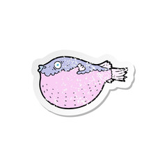 retro distressed sticker of a cartoon blowfish