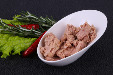 Tasty canned tuna fish in the bowl