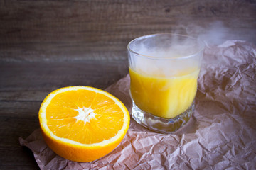 Orange juice, summer cocktail with citrus. Cool cocktail and orange.