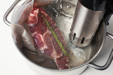 Sous vide cooking in pot  - 251644020