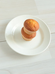 Two Muffins on a plate.Minimalizm