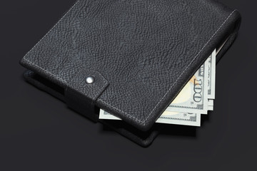 Close up of wallet with cash money isolated on black background. 3d rendering.