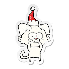 nervous dog distressed sticker cartoon of a wearing santa hat