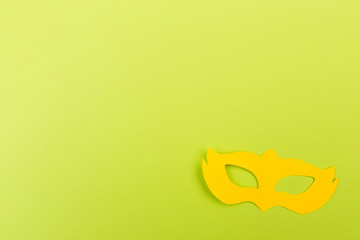 cut out colored paper figures for the holiday Mardi Gras