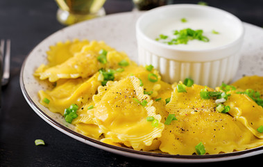 Ravioli with spinach and ricotta cheese. Italian cuisine.