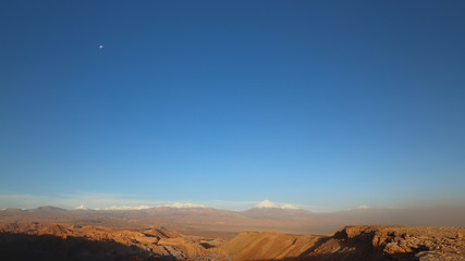 Fototapeta na wymiar View of the landscape of rocks of the Mars Valley (Valle de Marte) and Cordillera de la Sal, Atacama Desert, Chile