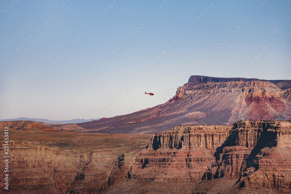 Sticker helicopter flying over grand canyon west rim - arizona, usa