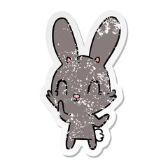 distressed sticker of a cute cartoon rabbit