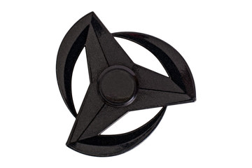 Spinner toy black color for stress relief on white background, isolated