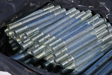 Nuts and bolts closeup on construction site. Begin installation work. Necessary equipment for the...