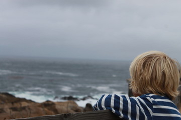 chiled looking at the sea