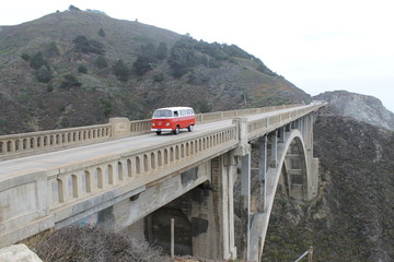 red car on the bridge 