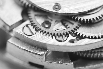 Black and white photography. Background with metal gear wheels. Macro.