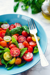 Tomatoes salad with basil