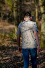 Teenage boy outside on a bright Spring day