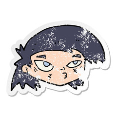 distressed sticker of a cartoon scratched up face