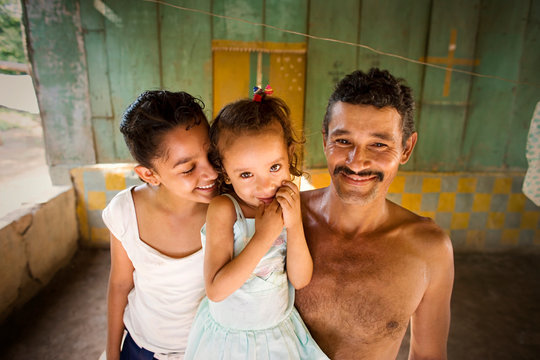 View of a man with his daughters.