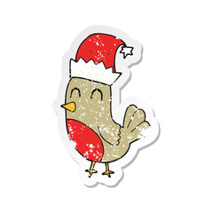 retro distressed sticker of a cartoon christmas robin