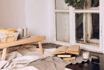 Breakfast on a wooden tray on the bed.