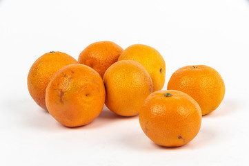 Seven tangerines isolated