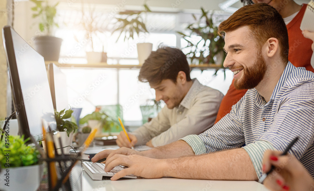 Poster System administrator working on computer in office