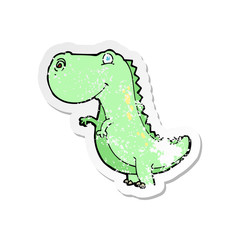 retro distressed sticker of a cartoon dinosaur