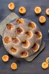 apricot cake on a brown wooden table