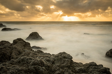 Beautiful scenic of the rocky California coast at sunset, extremely long exposure