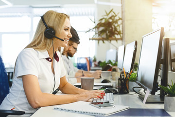 Business woman working at call center office