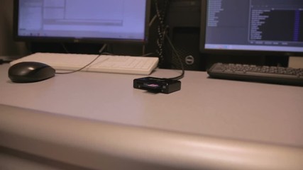 Hand inserting SD card