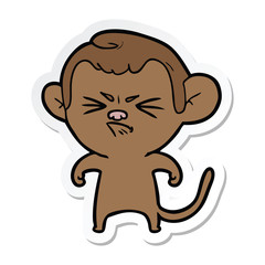 Obraz premium sticker of a cartoon annoyed monkey