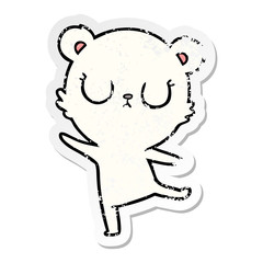 distressed sticker of a peaceful cartoon polar bear