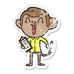 Fototapeta premium distressed sticker of a cartoon laughing monkey