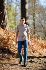 Teenage boy outside on a bright Spring day