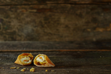 Chiacchiere on a wooden background 