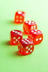 Red glass playing dices.