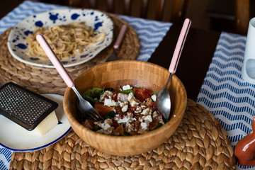 green salad with blood oranges, goat cheese and red pepper