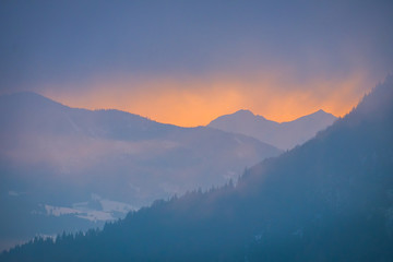 View over valley Ennstal to sunset over mountains Gumpeneck, Hangofen