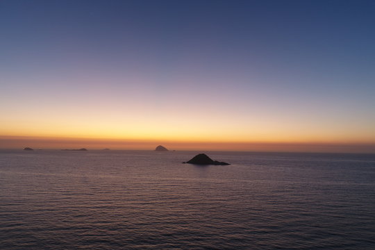 Sunrise at the sea with a litle island